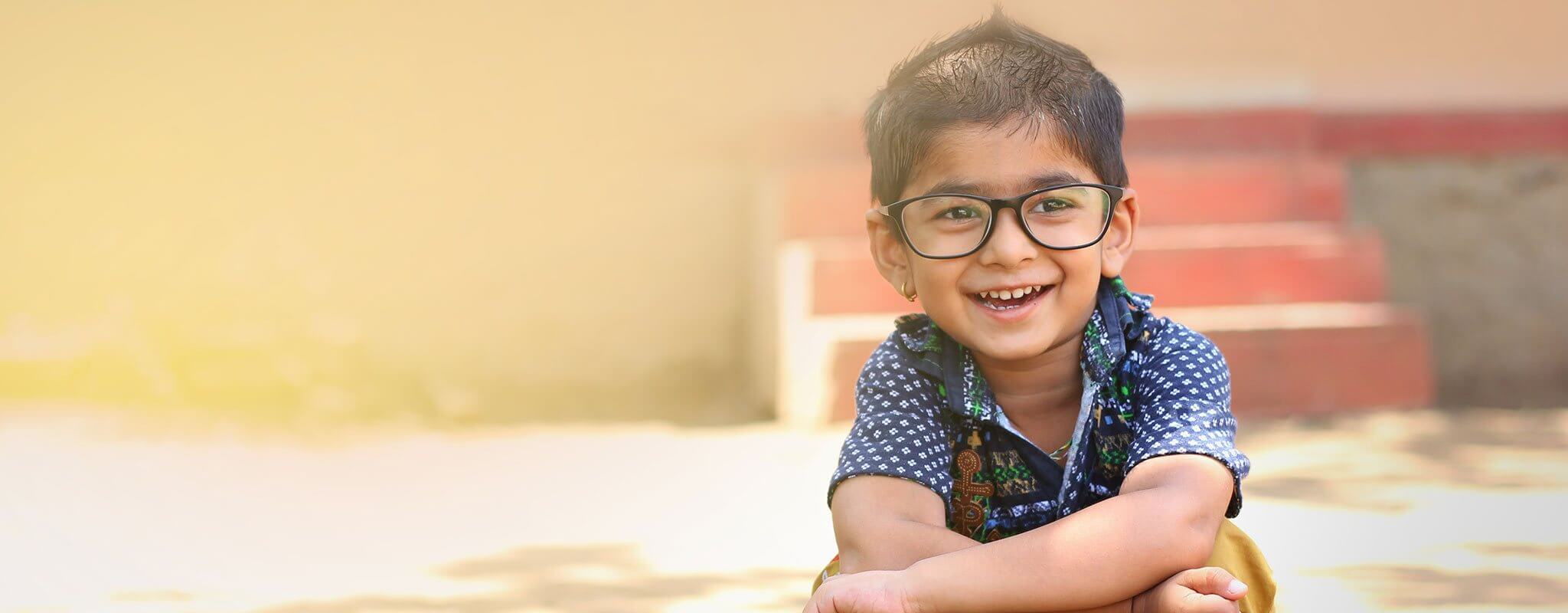 Indian boy wearing glasses Banner image for Gwinnett Pediatrics and Adolescent Medicine, Gwinnett Pediatricians